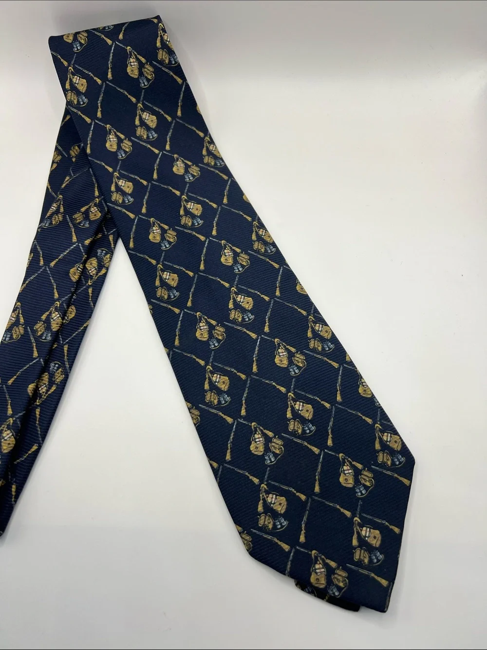 502. Burberrys Navy Tie with Gold Crest Pattern